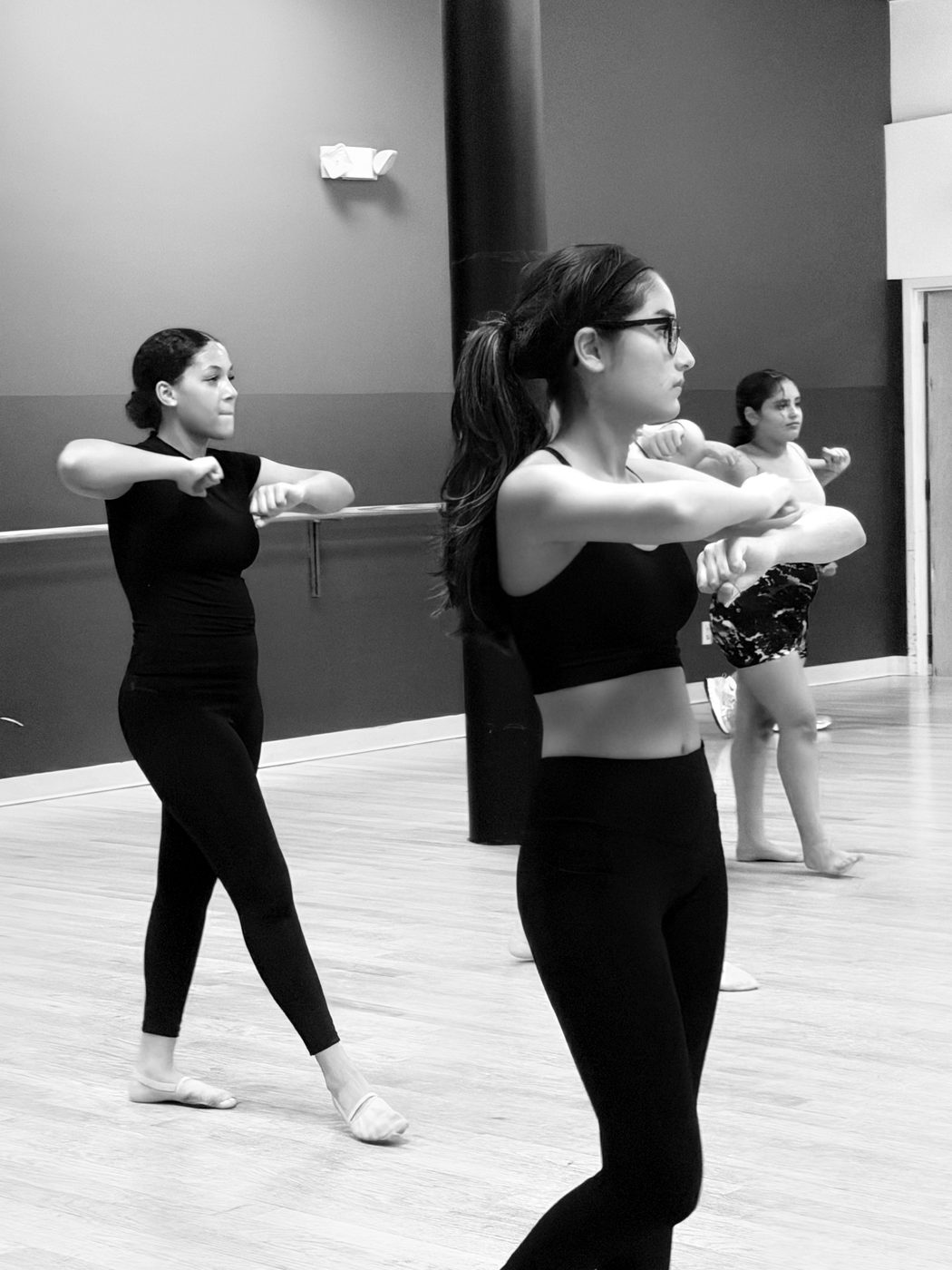 Two dancers in class