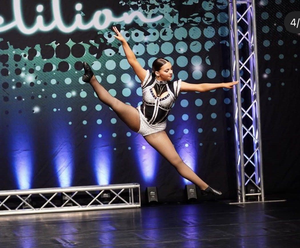 Senior dancer in a tilt on stage