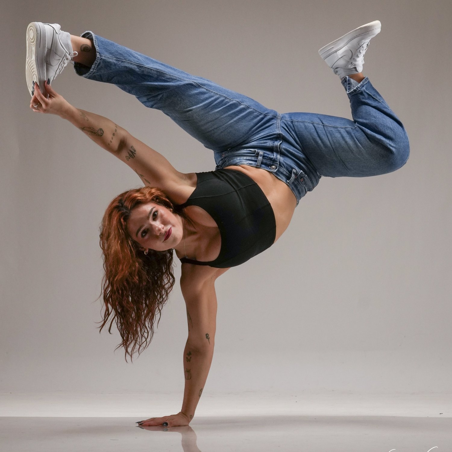 Josalyn in a one-arm balance